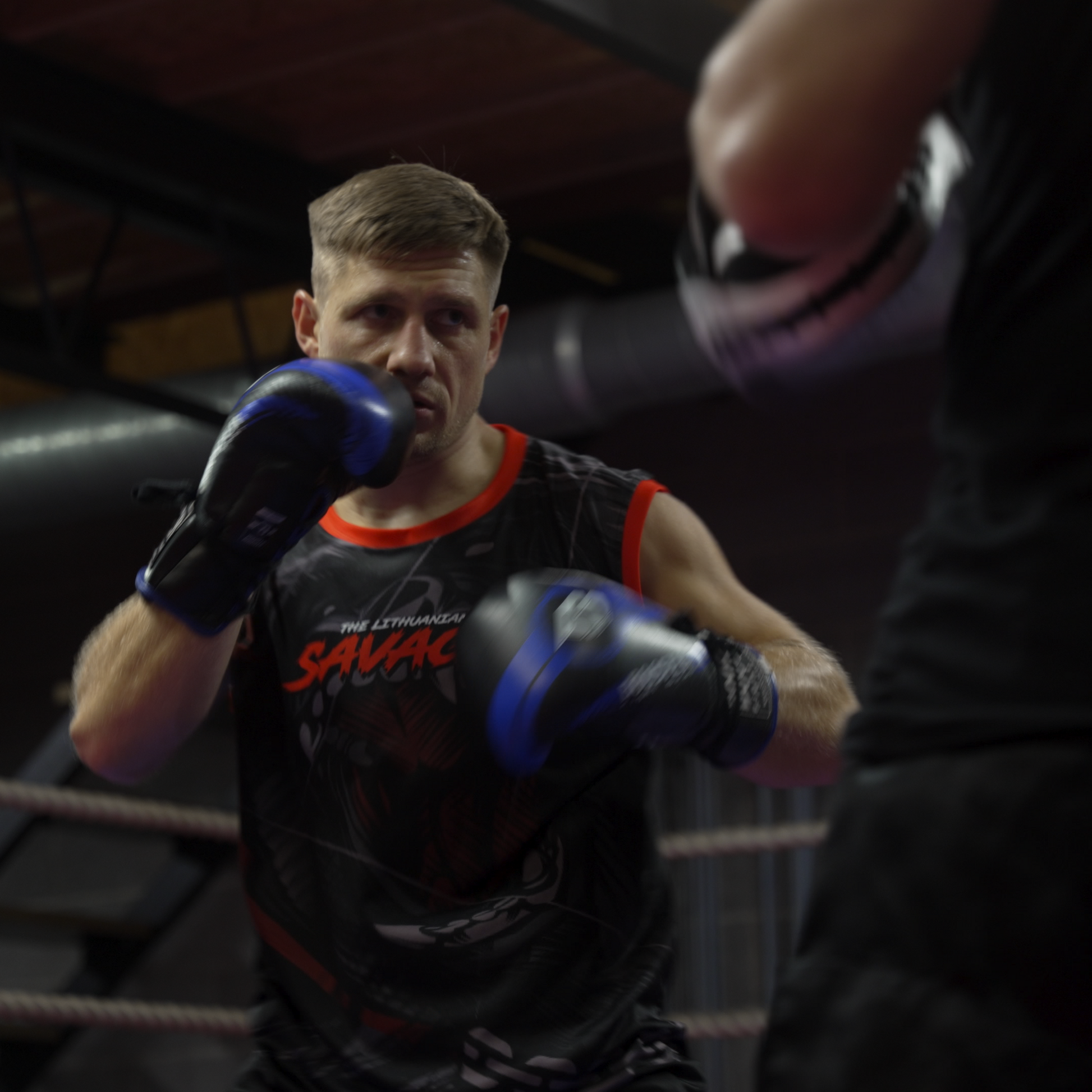 Boxer in training with a focus on technique and form.
